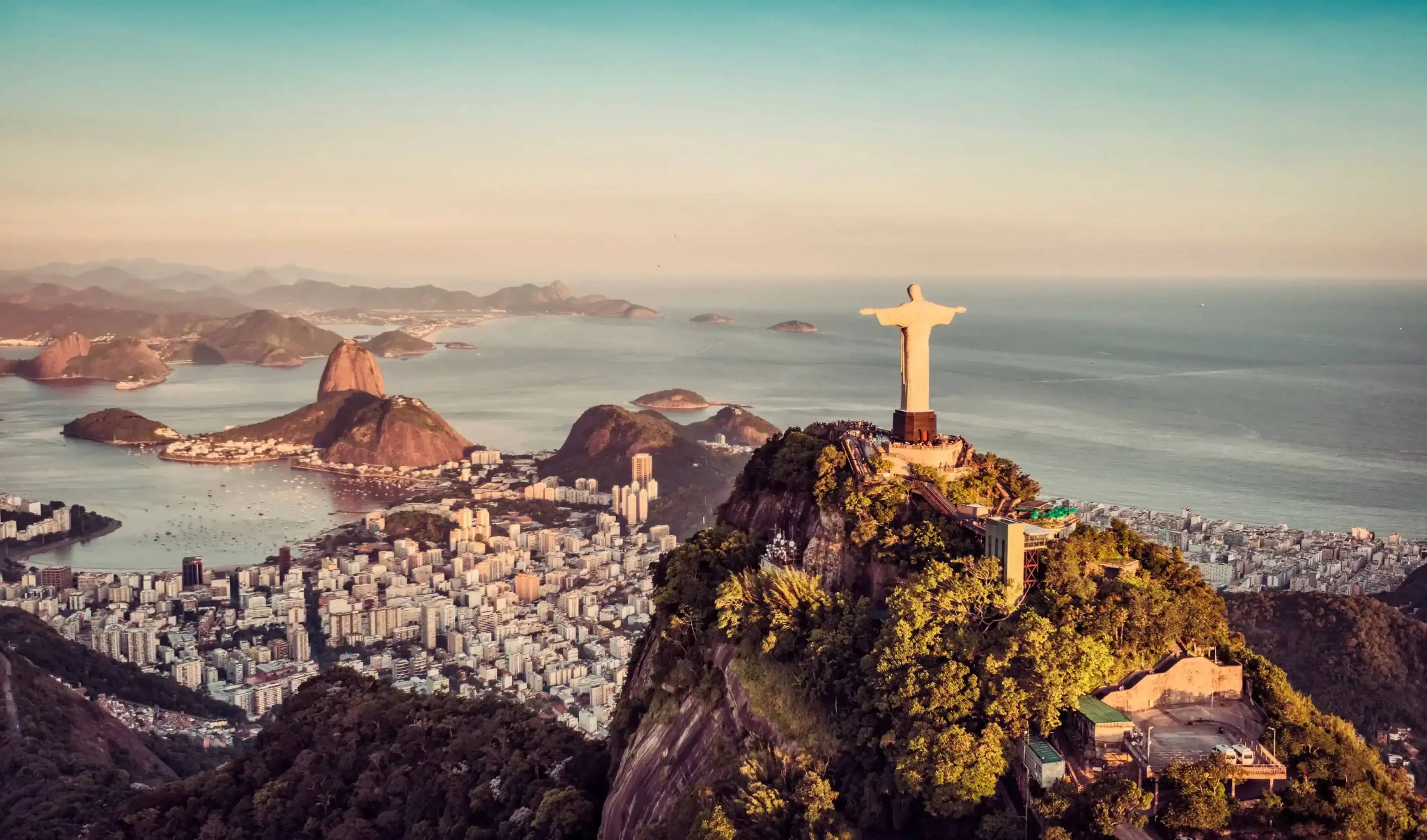 "Aerial view of Christ the Redeemer statue overlooking Rio de Janeiro, Brazil"