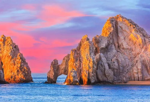 "Sunset view of El Arco rock formation at Cabo San Lucas, Baja California, Mexico."