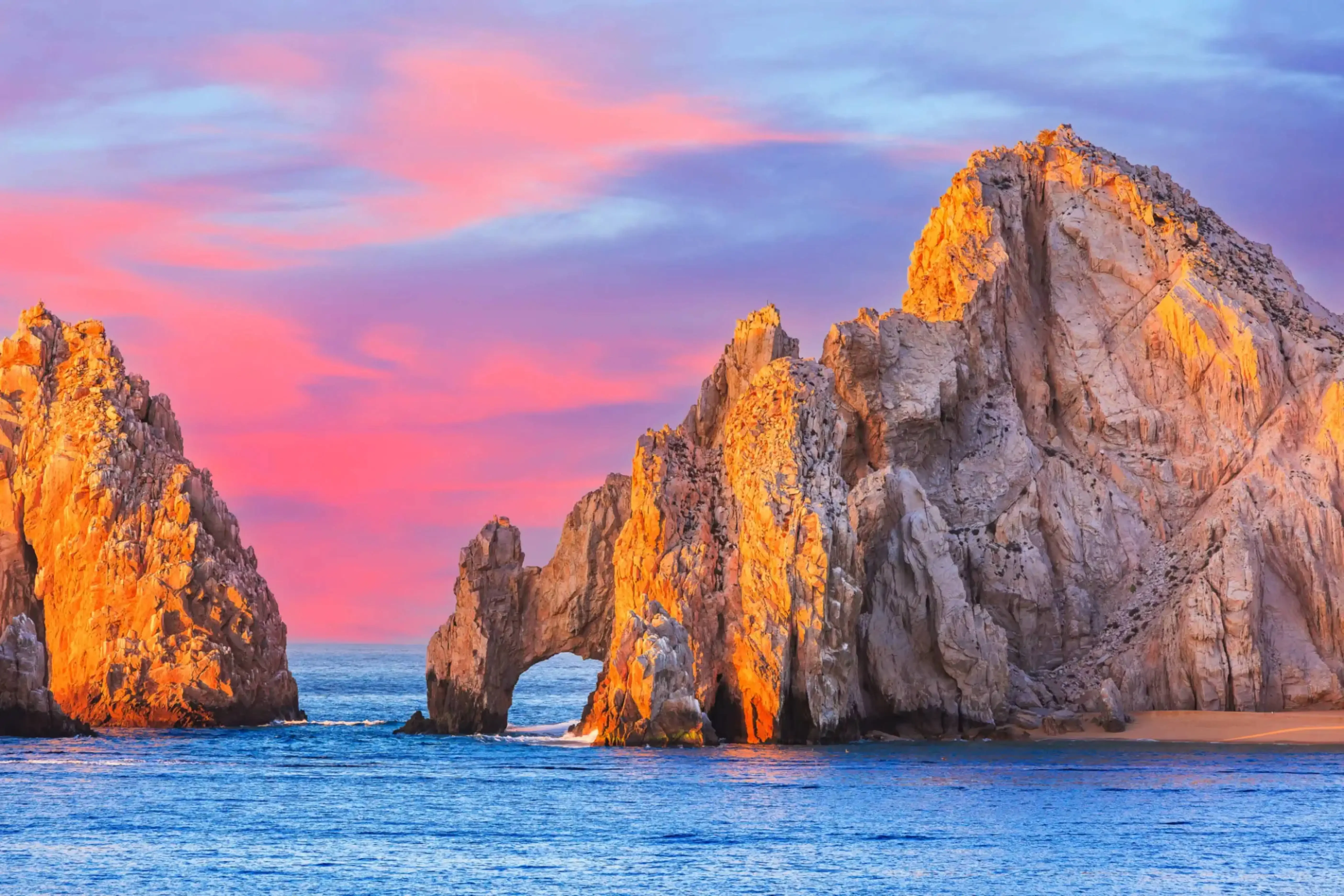 "Sunset view of El Arco rock formation at Cabo San Lucas, Baja California, Mexico."
