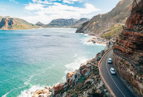 "Scenic drive along Chapman’s Peak Drive overlooking the Atlantic Ocean near Cape Town, South Africa."