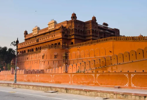 Junagarh Fort in Bikaner, Rajasthan, India, showcasing red sandstone architecture at sunset