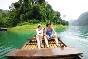 Bamboo raft crossing Cheow Lan Lake in Khao Sok National Park