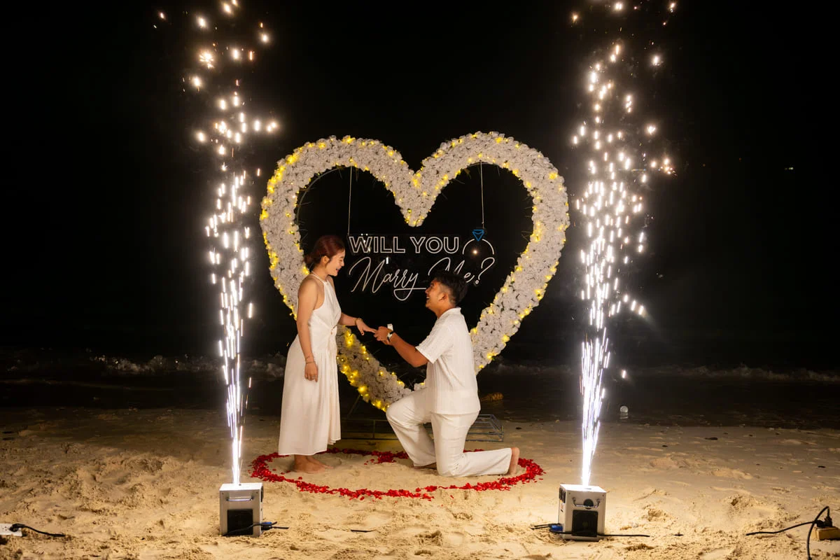 couple enjoying sunset dinner Coral Island Phuket
