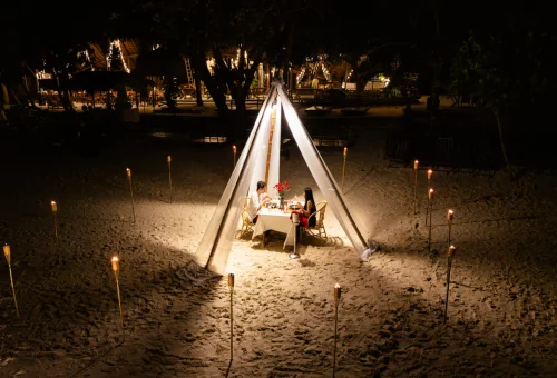 Phuket sunset dinner beach candles Coral Island