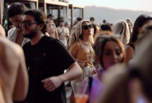 Luxury Yona Beach Club Phuket pool party with cocktails and sea views