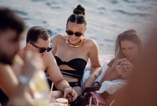 Luxury floating beach club Yona Phuket with party atmosphere and pool