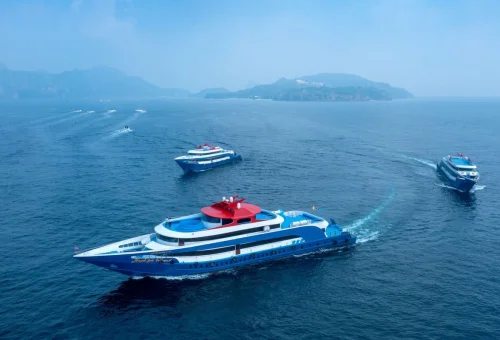 Ferry from Phuket heading to Phi Phi Islands over clear blue water