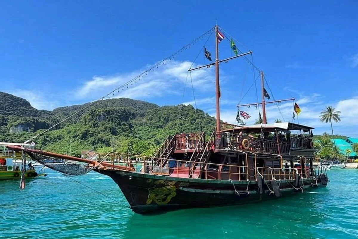 Snorkeling from pirate boat Phi Phi Islands clear blue water Thailand