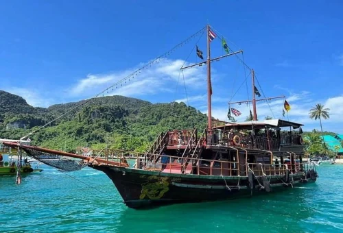 Snorkeling from pirate boat Phi Phi Islands clear blue water Thailand