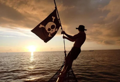 Pirate cruise boat Phi Phi Islands tropical lagoon Thailand scenery