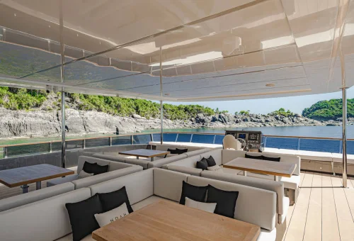 Luxury catamaran anchored in the turquoise waters of Maiton Island.
