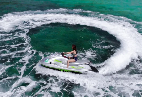 Jet ski adventure at Koh Larn Coral Island on turquoise waters near Pattaya Thailand
