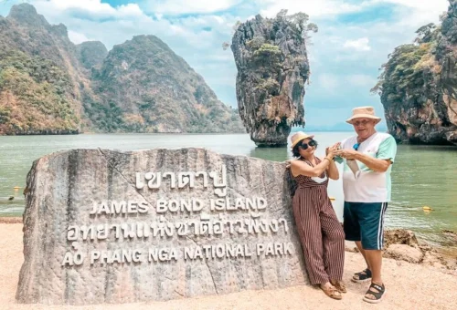 Couple visiting James Bond Island on a private tour from Phuket