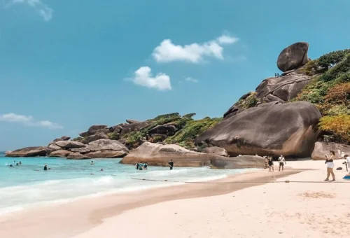 Similan Islands private tour with white sand beach, granite rocks and turquoise water