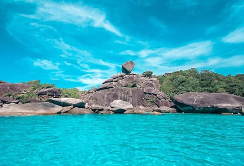 Iconic granite rock landscape at the Similan Islands seen from a private speedboat