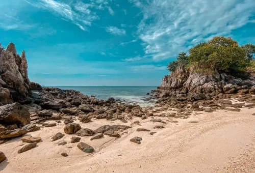 Khai Island white sandy beach and rocky coastline Phuket family tour