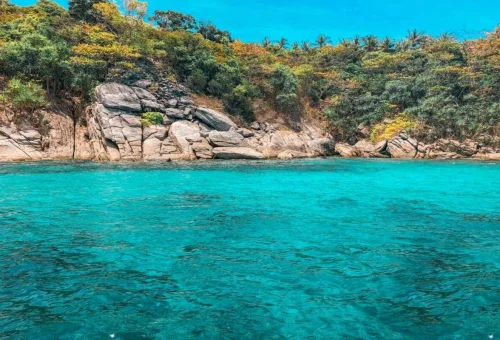 Raya Noi Island crystal-clear turquoise water on private tour from Phuket