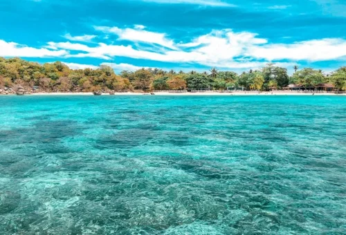 Raya Yai Island beach and turquoise water on private speedboat tour from Phuket