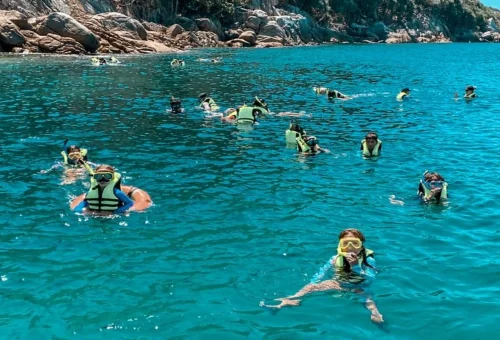 Raya Noi snorkeling with clear water on private speedboat tour from Phuket