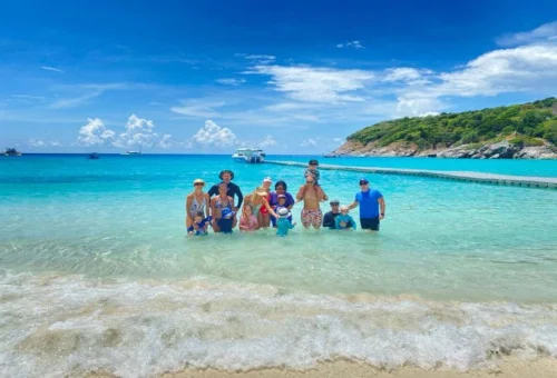 Family enjoying Raya Yai beach on private speedboat tour from Phuket