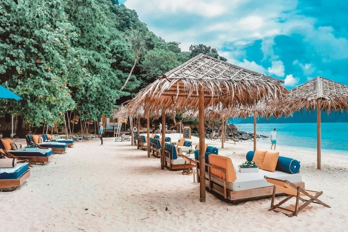 Beautiful Coral Island beach with white sand and turquoise water near Phuket