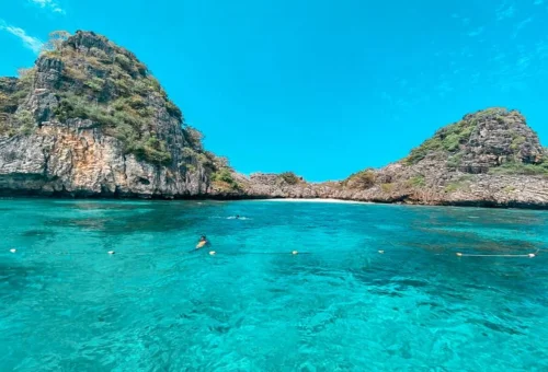 Snorkeling in crystal-clear waters at Koh Haa Thailand