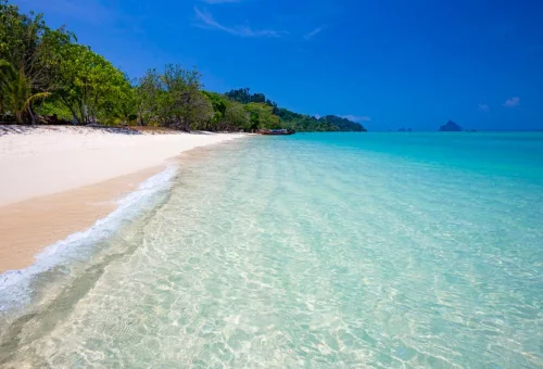White sandy beach and turquoise sea at Koh Kradan
