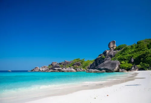 White sand beach and granite rocks at Similan Islands