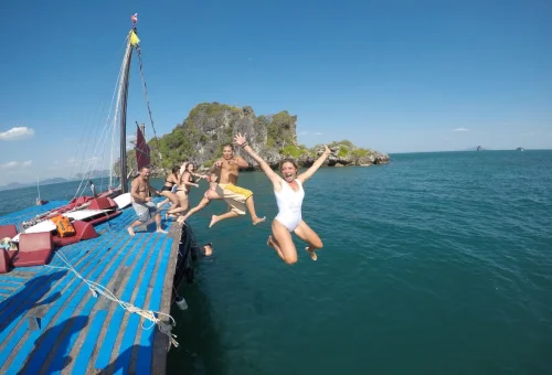 Krabi Island Cruise Guests Jumping Into Sea