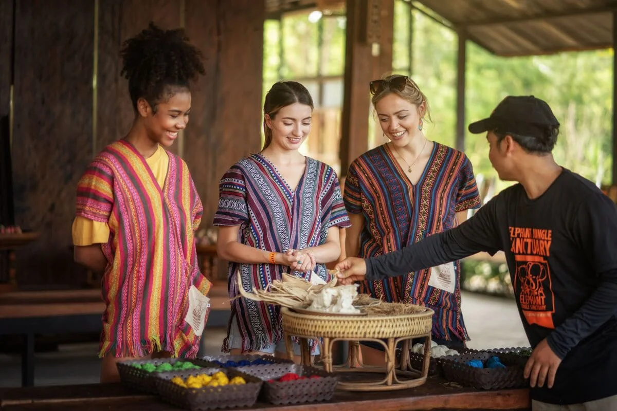 Visitors taking part in a sustainable craft activity at Elephant Jungle Sanctuary Chiang Mai