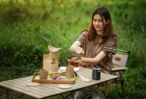 Visitor enjoying a sustainable outdoor experience during the Elephant Jungle Sanctuary Watch Me Experience in Chiang Mai