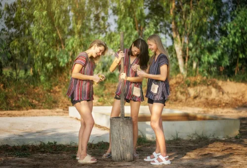 Visitors preparing to feed rescued elephants during a Pattaya Elephant Jungle Sanctuary tour