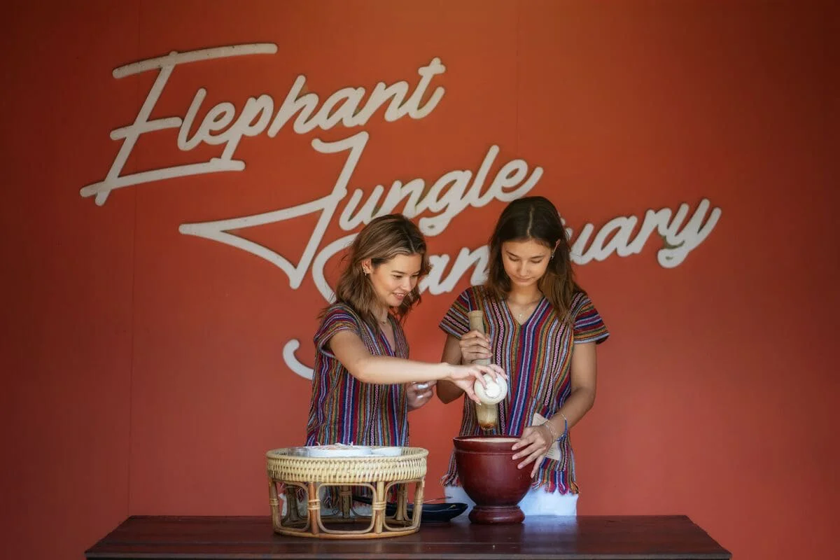 Visitors preparing elephant nutrition food at Samui Elephant Jungle Sanctuary