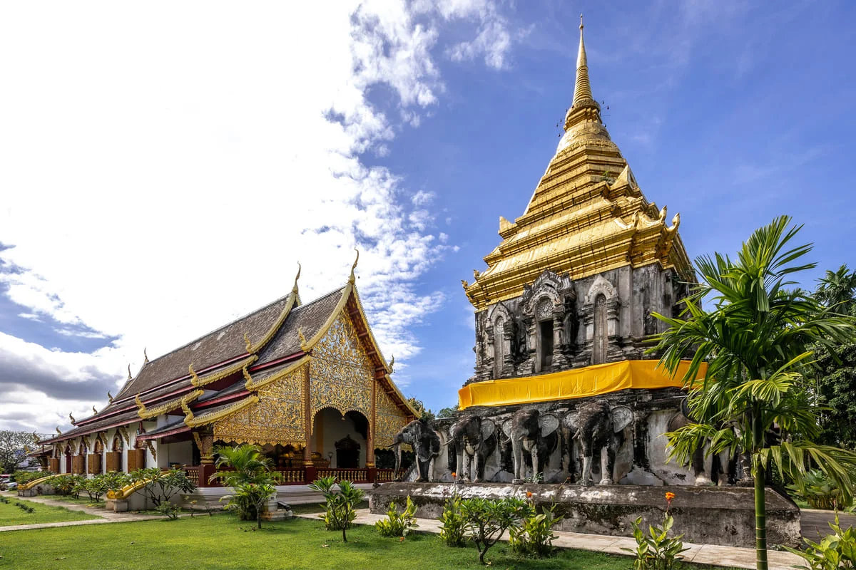 Golden chedi and ornate Lanna temple architecture in Chiang Mai