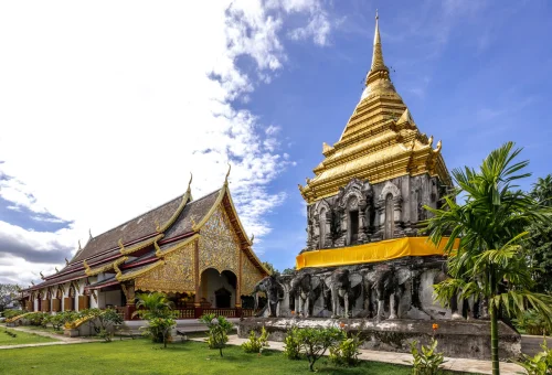 Golden chedi and ornate Lanna temple architecture in Chiang Mai
