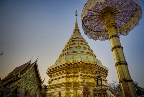 Golden chedi and traditional umbrella at Wat Phra That Doi Suthep