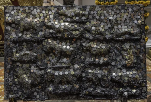 Traditional coin-covered shrine at Wat Phra That Doi Suthep