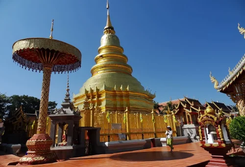 Golden stupa at Wat Phra That Hariphunchai in Lamphun Thailand