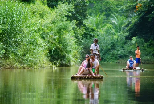 Tourists bamboo rafting on Mae Win River in Mae Wang Chiang Mai