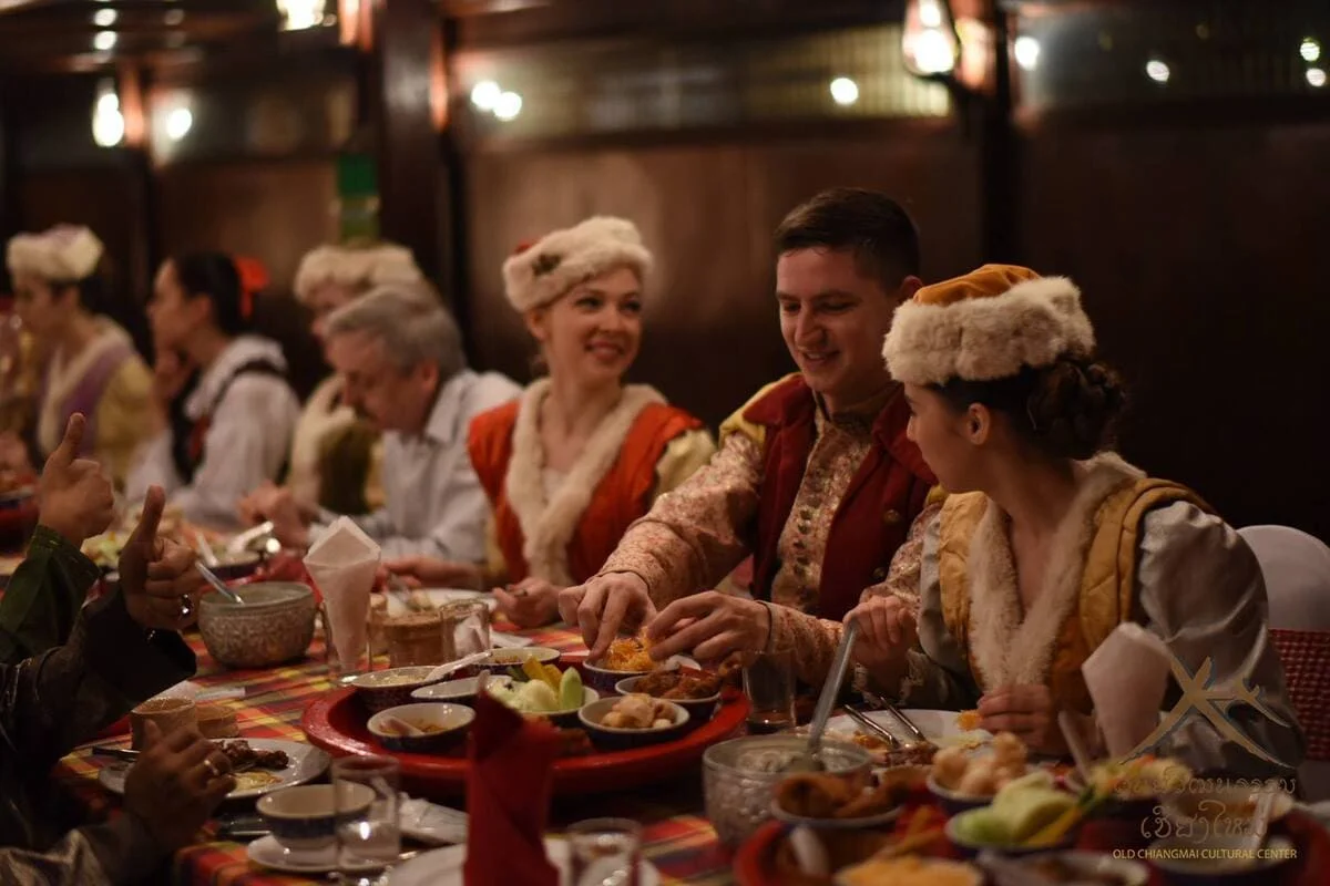 Guests enjoying Northern Thai food at a Chiang Mai Khan Toke dinner