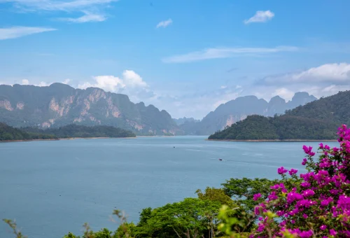 Panoramic view of Cheow Lan Lake with emerald water, green islands and limestone mountains
