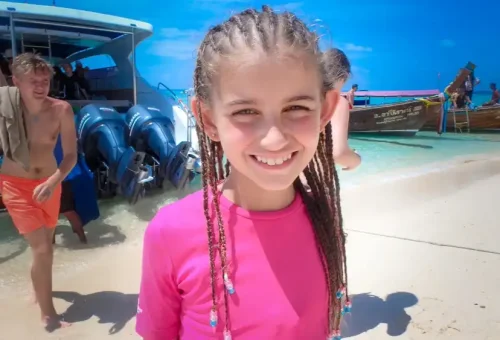 Children enjoying early-morning fun aboard a boat near Phi Phi Islands