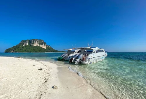 Tub Island beach with clear shallow waters, white sand, and a sandbar connecting it to nearby islands, part of the Krabi 4 Islands Tour.