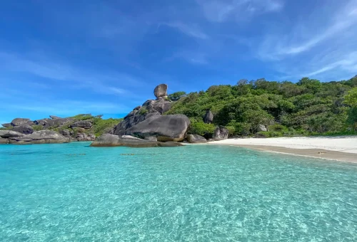 Famous Sailing Rock landmark at Similan Island, a large granite boulder balanced atop a cliff with panoramic sea views