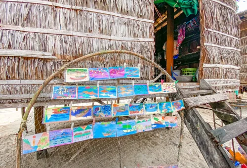 Handcrafted items made by the Moken people at Surin Islands, including woven baskets and traditional tools on display