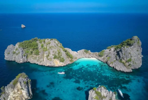 Amazing panoramic view of Koh Haa’s limestone islets surrounded by clear turquoise water and vibrant coral reefs