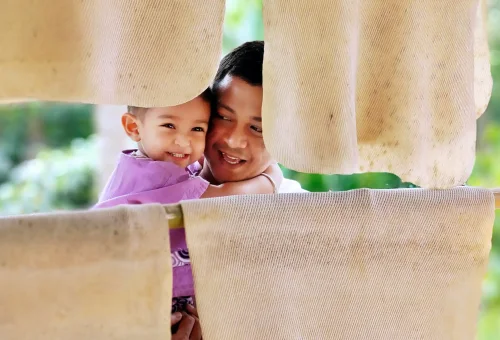 Rubber mats drying in the sun at Old Phuket Farm, showcasing traditional methods of natural rubber production