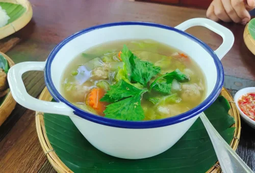 Authentic Thai lunch set at Old Phuket Farm with traditional dishes served in a rustic outdoor setting