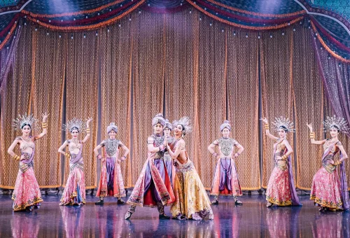 Simon Cabaret Phuket stage scene featuring performers in themed costumes during a lively musical number.