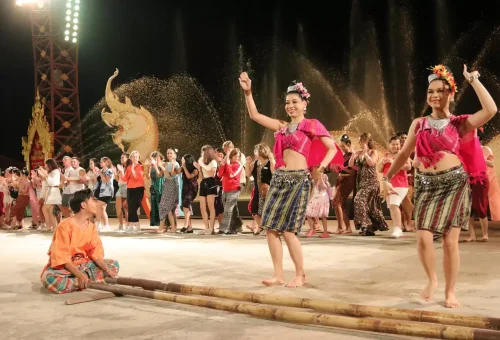 Traditional Thai ceremony reenacted on stage at Siam Niramit Phuket, with ornate costumes and spiritual atmosphere.